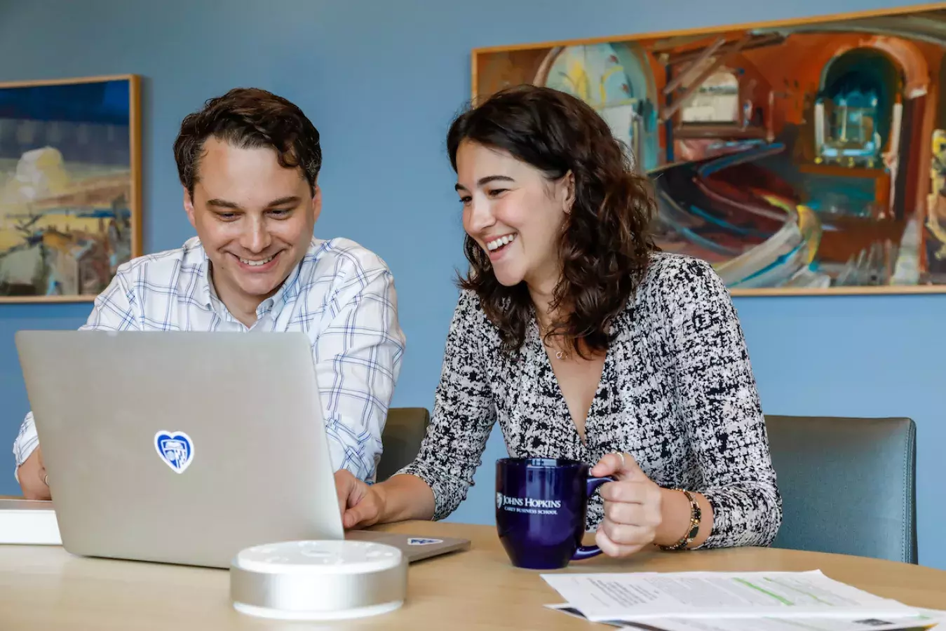 two student working on a computer together