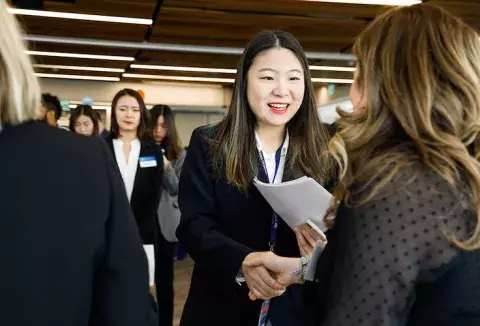 handshake-single-callout.jpg students shaking hands